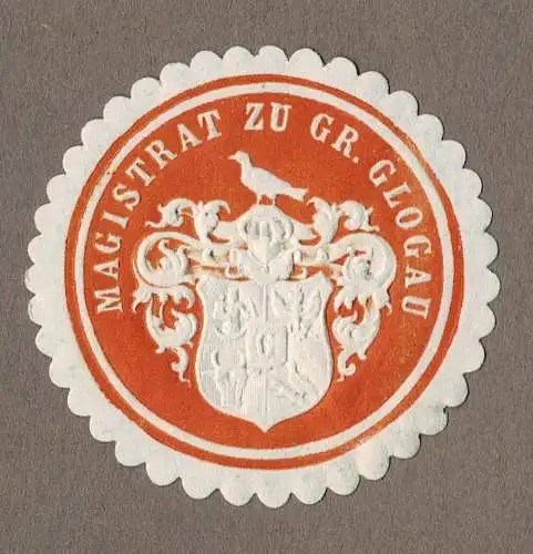 Siegelmarke Schlesien: MAGISTRAT ZU GR. GLOGAU (Głogów), orange