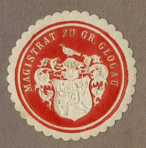 Siegelmarke Schlesien: MAGISTRAT ZU GR. GLOGAU (Głogów), rot