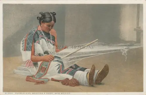NEW MEXICO - Pueblo girl weaving a bash