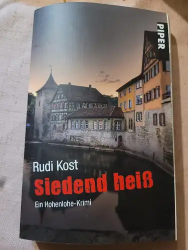 Siedend heiß Kost, Rudi: