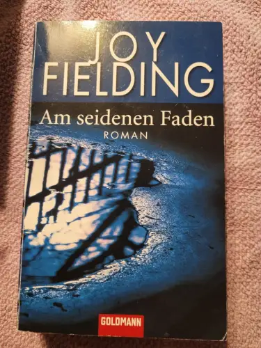 Am seidenen Faden : Roman. Fielding, Joy: