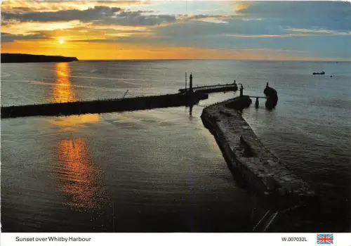 BT18416 sunset over whitby harbour uk