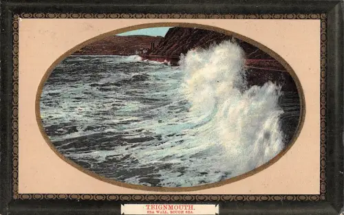 uk32961 sea wall rough sea teignmouth uk