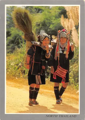 BT12080 Eko Hilltrobe woman is walking back home tahiland Thailand