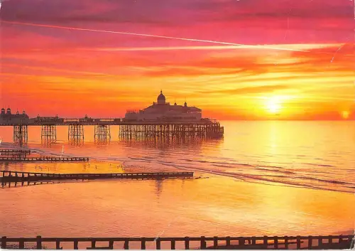 B103225 sunrise over the pier eastbourne uk