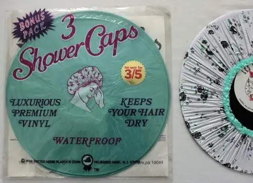 Les Savy Fav 3/5   Vinyl LP mit 3 Shower Caps Duschhauben   Vinyl weist einige oberflächliche Spuren die von den Duschhauben stammen. 