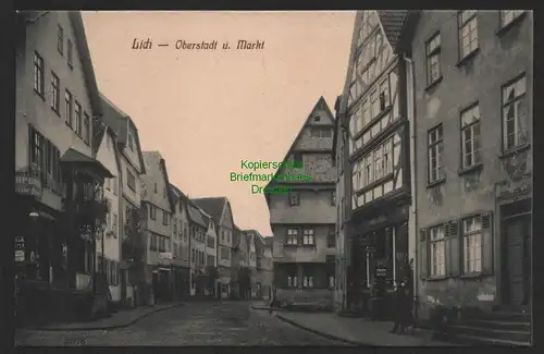 155191 AK Lich um 1910 Oberstadt und Markt Straße Fachwerkhaus