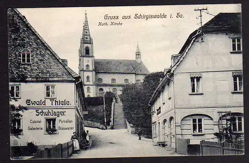 63208 AK Schirgiswalde Kath. Kirche 1919 Schuhlager Thiele Colonialwaren