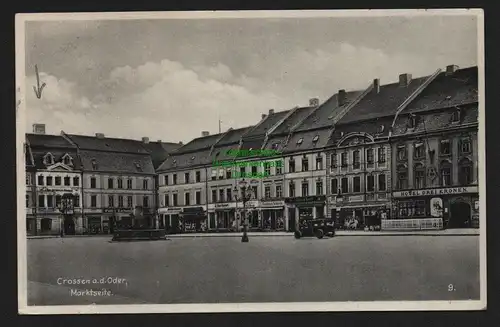 149386 AK Crossen Oder 1938 Marktseite Hotel zur goldenen Sonne, drei Kronen