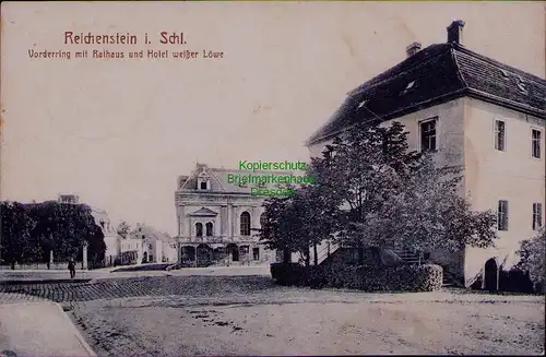 156750 AK Reichenstein in Schlesien 1918 Vorderring m. Rathaus Hotel weißer Löwe
