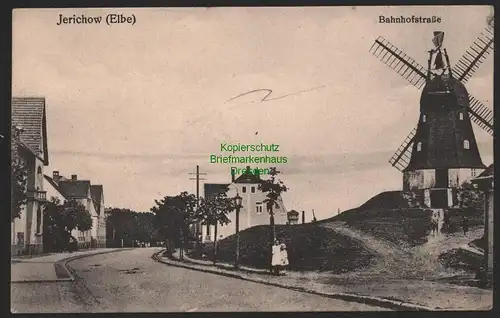 144749 AK Jerichow Elbe Bahnhofstraße mit Windmühle Mole um 1915