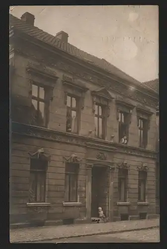134822 AK Dortmund 1911 Fotokarte markanntes Haus mit Frauenköpfen an d Fassade