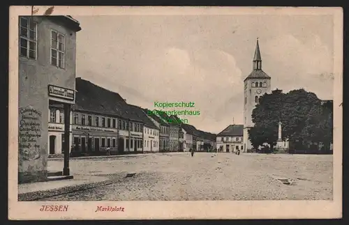 148924 AK Jessen Bez. Halle 1909 Marktplatz Colonialwaren Gasthof zum Adler