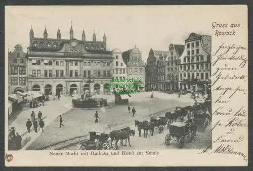 138828 AK Rostock Neuer Markt mit Rathaus und Hotel zur Sonne 1904