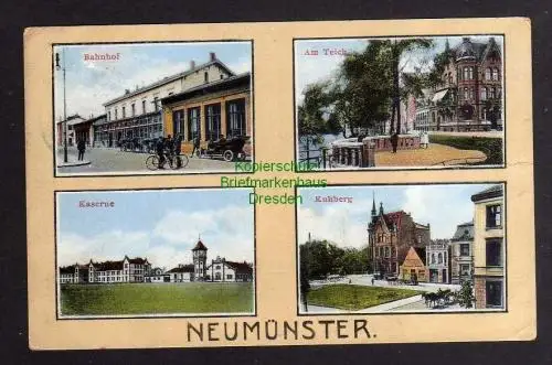 122059 AK Neumünster Bahnhof Kaserne Kuhberg Am Teich 1916