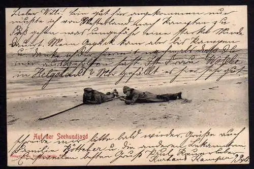 73234 Ansichtskarte Auf der Seehundjagd 1904 Jäger am Strand liegend