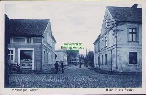 161357 AK Mohrungen, Ostpr. um 1920 Blick in die Poststr. Obeländer An- und Ver