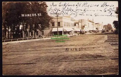 172179 AK Wamego Kansas 1913 Fotokarte Main Street Plessens Store Groceries