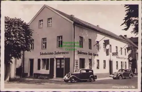 157737 Ansichtskarte Königswarta Sa. Gasthaus Jägerhof Schokoladen Zuckerwaren Papier Tabak