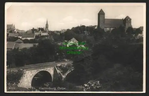 143280 AK Rastenburg Ostpr. 1942 Fotokarte mit Eisenbahnbrücke