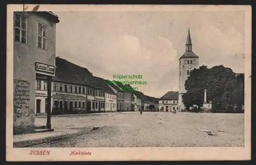 148924 Ansichtskarte Jessen Bez. Halle 1909 Marktplatz Colonialwaren Gasthof zum Adler