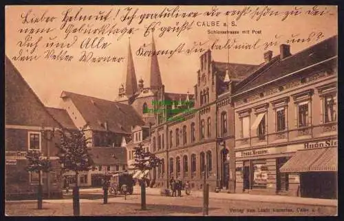 173882 Ansichtskarte Calbe Saale 1905 Schlossstrasse mit Post Geschäfte Franz Messow