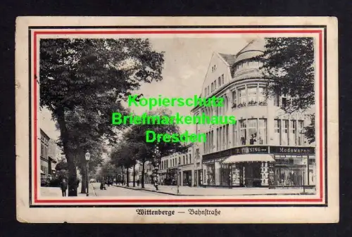 114337 AK Wittenberge Bez. Potsdam 1916 Bahnstraße Th. Henning Modewaren