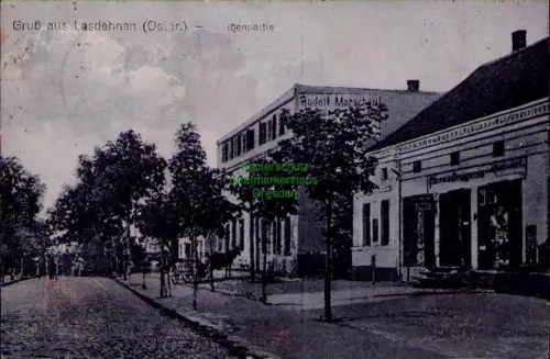 164965 AK Gruß aus Lasdehnen (Ostpr.) 1920 Straßenpartie Geschäftshaus Rudolf Ma
