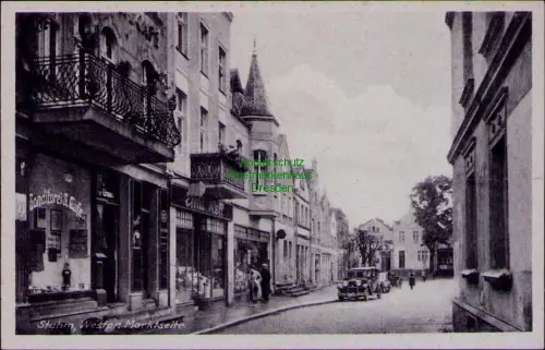 194624 AK Stuhm W.-Pr. Marktseite Konditorei Cafe um 1940