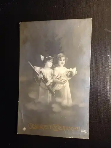 Glückwunschkarte zwei Mädchen mit Puppe und Gewehr 410277 gr