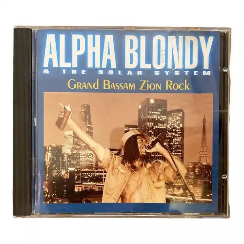 3133 Alpha Blondy ALPHA BLONDY & THE SOLAR SYSTEM: GRAND BASSAM ZION ROCK HC