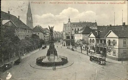 Freiburg Breisgau Kaiser Wilhelmplatz Kaserne Krieger Denkmal Kaiserkaffee Strassenbahn Kat. Freiburg im Breisgau