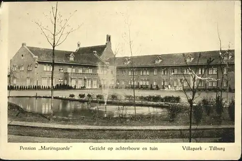Tilburg Villapark Pension Mariengaarde Gezicht op achterbouw en tuin *