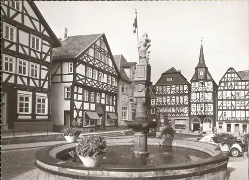 Fritzlar Fachwerkhaeuser am Markt Marktbrunnen Kat. Fritzlar