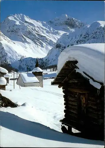 Sertig Doerfli Bergkirchli mit Plattenflue und Hoch Ducan