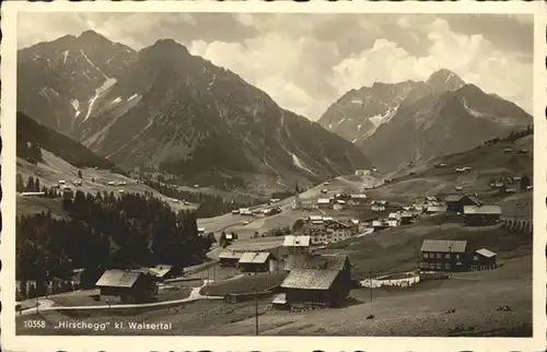 Hirschegg Kleinwalsertal Vorarlberg Ortsansicht mit Elferkopf Zwoelferkopf Widderstein und Baerenkopf Kat. Mittelberg