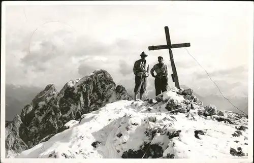 Bergsteigen Klettern Bergkreuz / Sport /