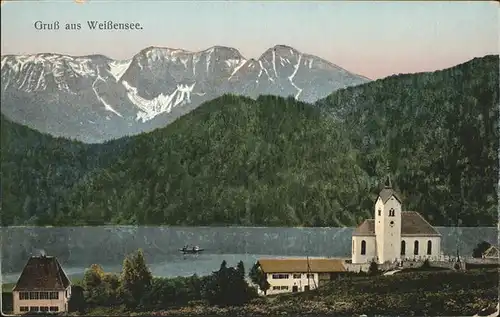 Weissensee Fuessen Ortsansicht mit Kirche Blick auf den See Kat. Fuessen