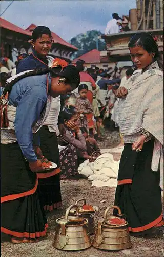 Kathmandu Typical women of Kathmandu valley preparing for worship Kat. Kathmandu