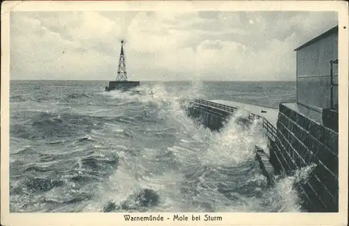 Warnemuende Ostseebad Mole bei Sturm Kat. Rostock