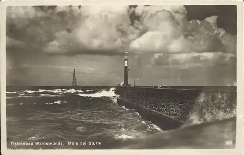 Warnemuende Ostseebad Mole mit Leuchtturm Kat. Rostock