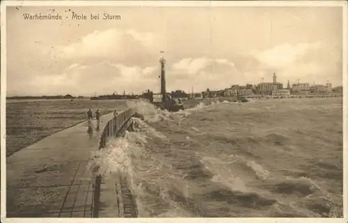 Warnemuende Ostseebad Mole mit Leuchtturm Kat. Rostock