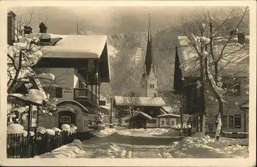 Bayrischzell Dorfpartie mit Kirche im Winter Kat. Bayrischzell