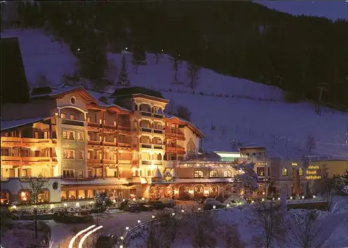St Johann Tirol Wellness Sporthotel Alpina bei Nacht mit Beleuchtung Kat. St. Johann in Tirol
