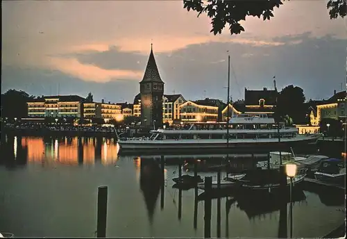 Lindau Bodensee am Hafen bei Nacht Turm Faehrschiff Kat. Lindau (Bodensee)