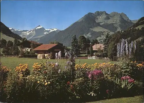 Gstaad Teilansicht mit Oldenhorn Stalenflueh im Fruehling Kat. Gstaad