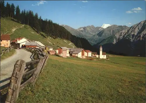 Lue Ortsansicht mit Kirche Muenstertal Blick gegen Ortler Kat. Lue