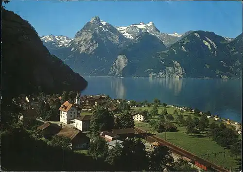 Sisikon Panorama mit Alpenblick Gitschen Urirotstock Urner Alpen Vierwaldstaettersee Eisenbahn Kat. Sisikon