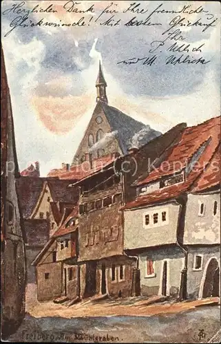 Freiberg Gasse mit Kirchturm Kuenstlerkarte Kat. Freiberg