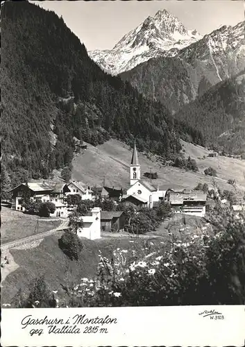 Gaschurn Vorarlberg Ortsansicht mit Kirche Blick gegen Valluela Blumenwiese Kat. Gaschurn